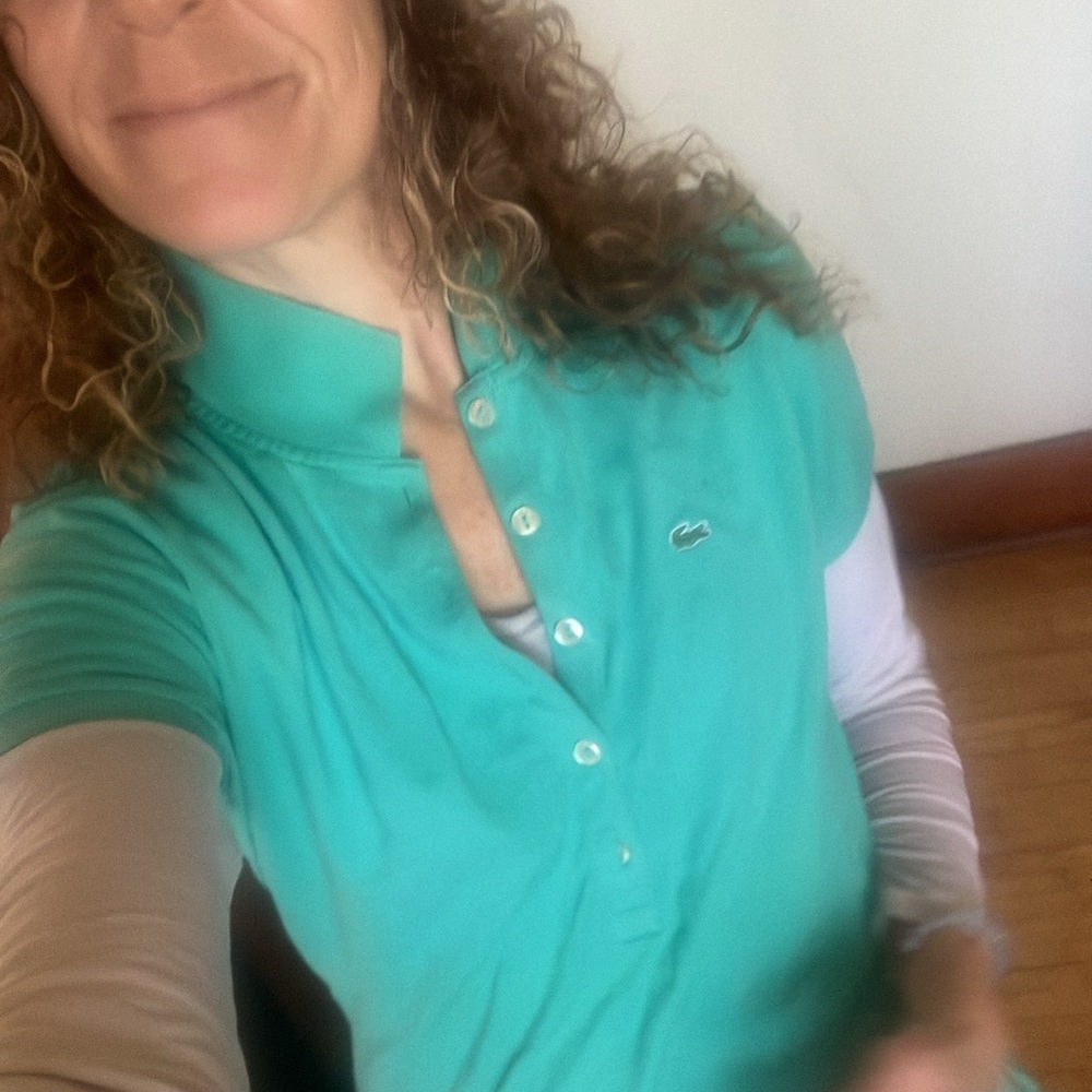 Lacoste size 42 fits a smalll light green polo.